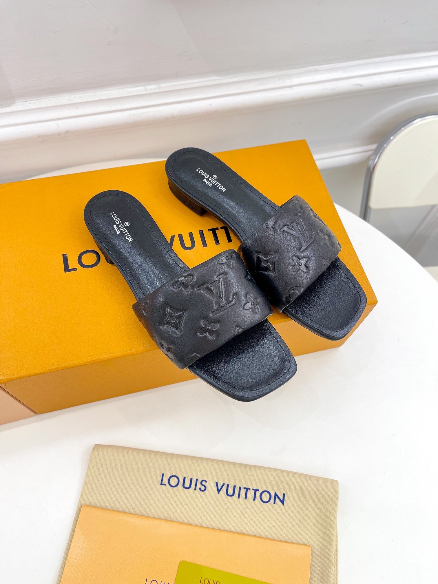 Louis Vuitton Women's Revival Flat Mule Black For Women LV 1A9P3T