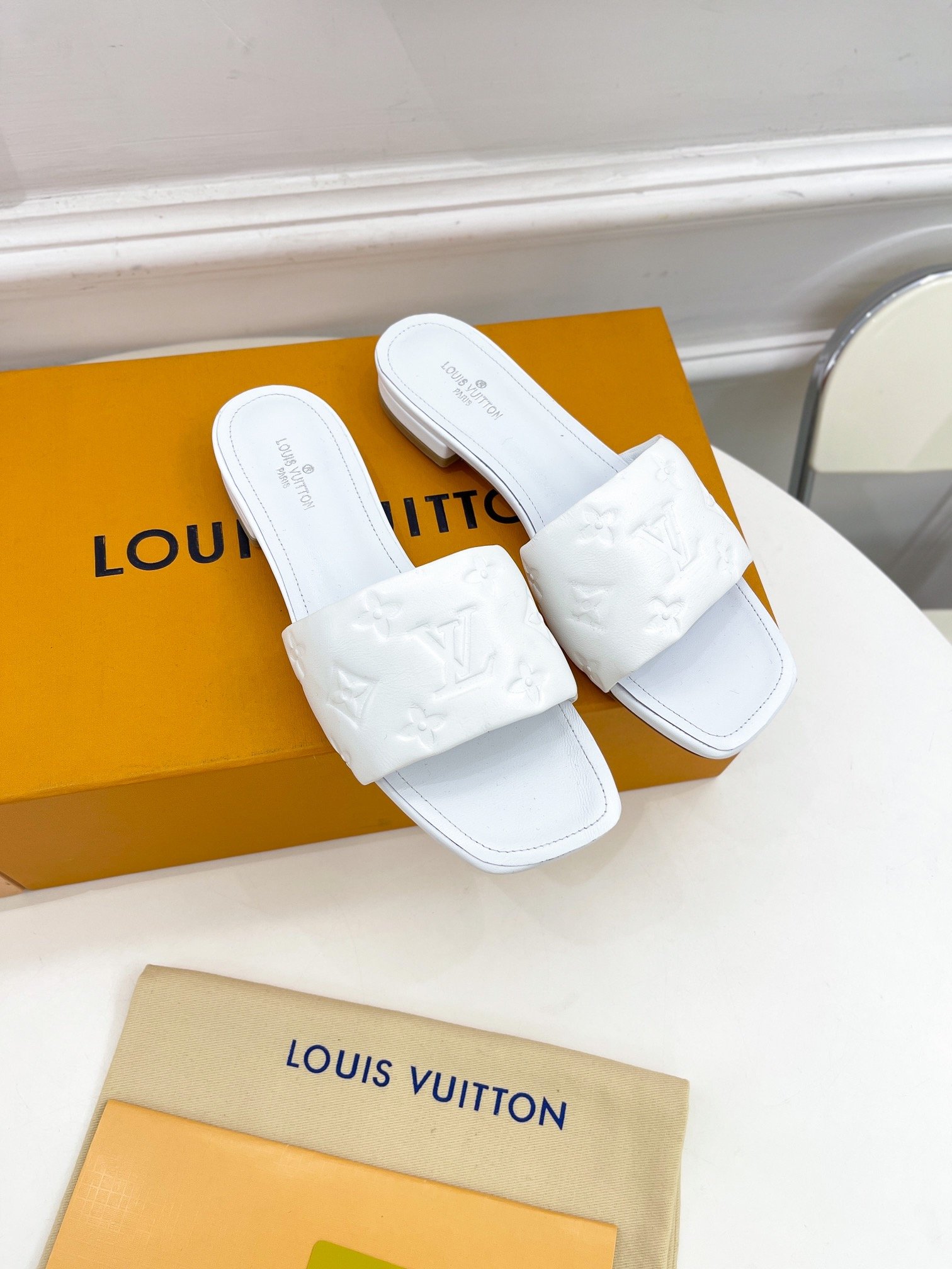 Louis Vuitton Women's Revival Flat Mule White For Women LV 1A9P4P